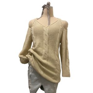 Cream knit sweater with cut out shoulders